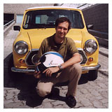 Kein Rodriguez portrait in front of his Mini Cooper